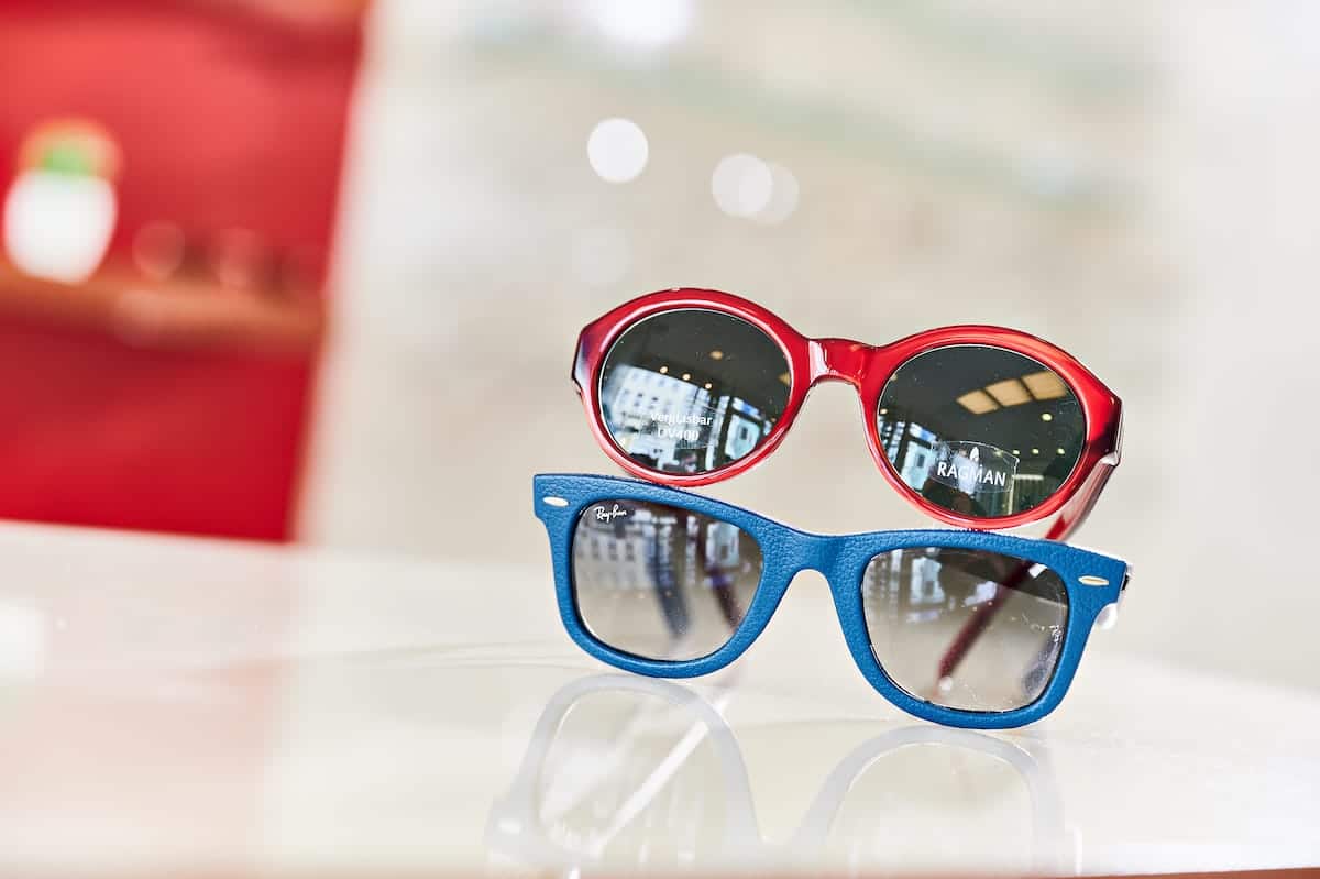 Optik Boysen Sonnenbrille und Kinderbrille rot und blau
